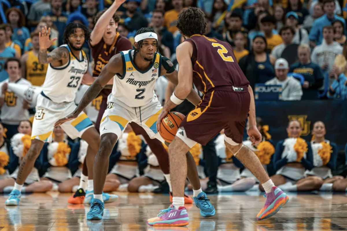 Chase Ross (2) helped Marquette post a single-game record 66 deflections in its win over Central Michigan. (Photo courtesy of Marquette Athletics.)